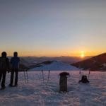 Excursions organized in the mountains at sunset with the snow